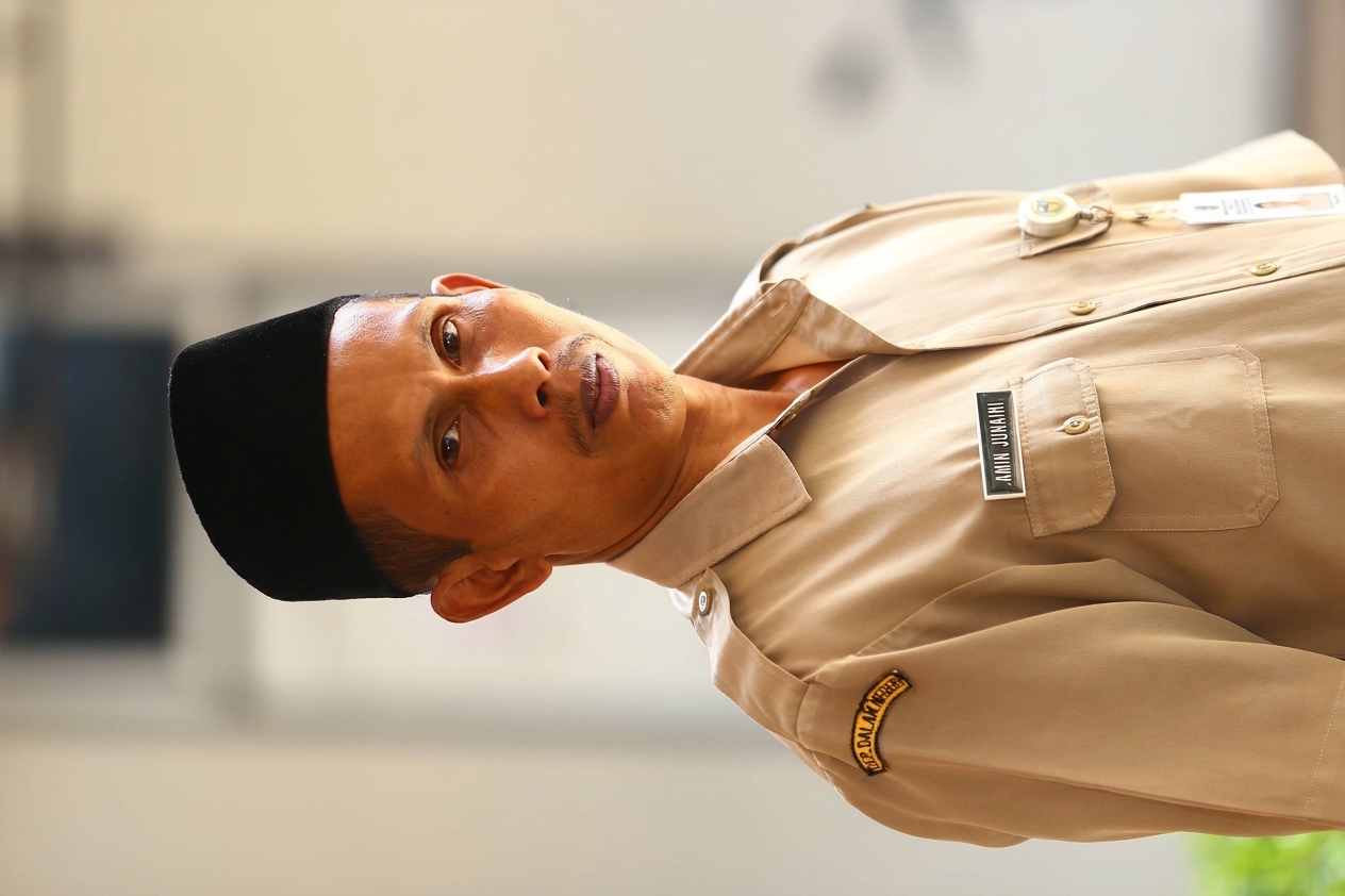 AMIN JUNAINI
